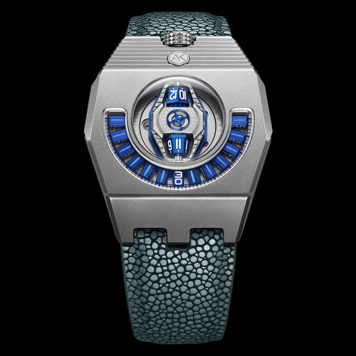 Luxury watch with blue accents and a textured strap on a black background
