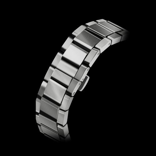 The ATOWAK COBRA features a unique revolving satellite wandering hour wheel. Hour indicators on three-wheel arms rotate 120˚ between four sides to indicate the 12 hours. With a faceted silver crown on the top of the watch, time flows in black serpentine. It’s mysterious, bold, and dangerous.