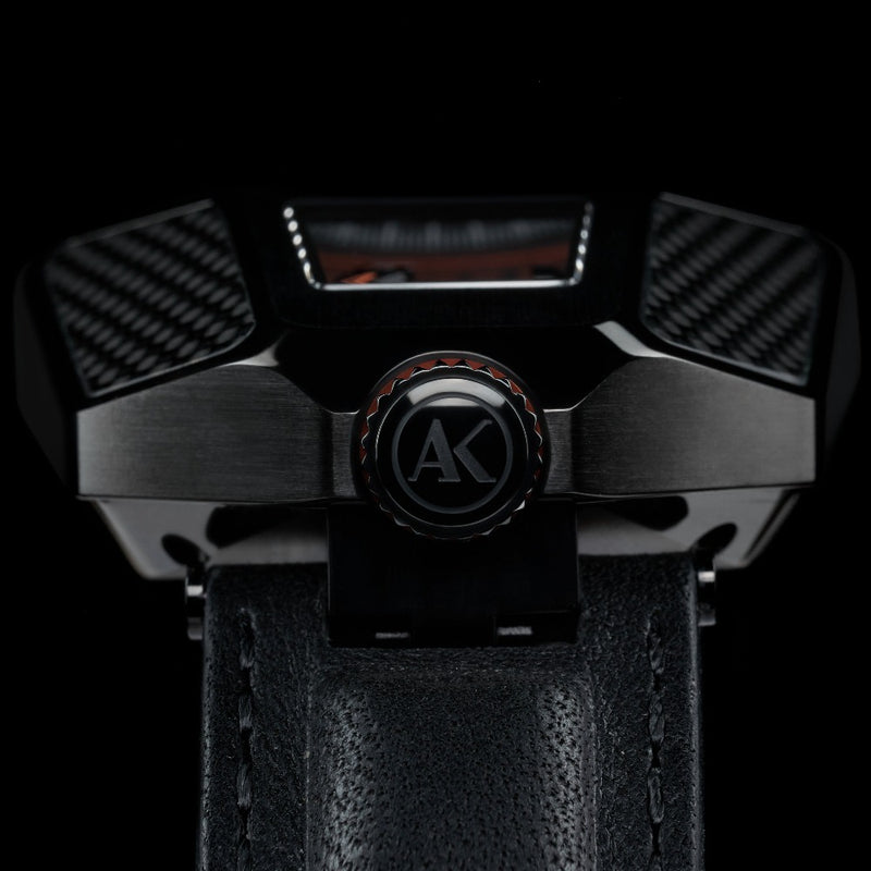 The ATOWAK COBRA features a unique revolving satellite wandering hour wheel. Hour indicators on three-wheel arms rotate 120˚ between four sides to indicate the 12 hours. With a faceted silver crown on the top of the watch, time flows in black serpentine. It’s mysterious, bold, and dangerous.