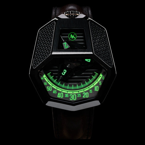 The ATOWAK COBRA features a unique revolving satellite wandering hour wheel. Hour indicators on three-wheel arms rotate 120˚ between four sides to indicate the 12 hours. With a faceted silver crown on the top of the watch, time flows in black serpentine. It’s mysterious, bold, and dangerous.